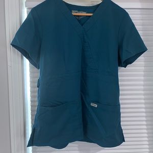 Greys Anatomy dark teal scrub top.